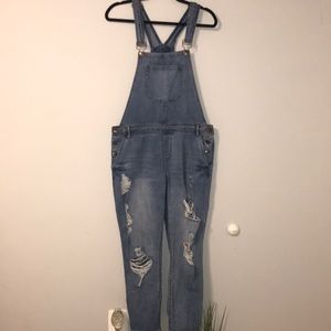 Ripped denim overalls